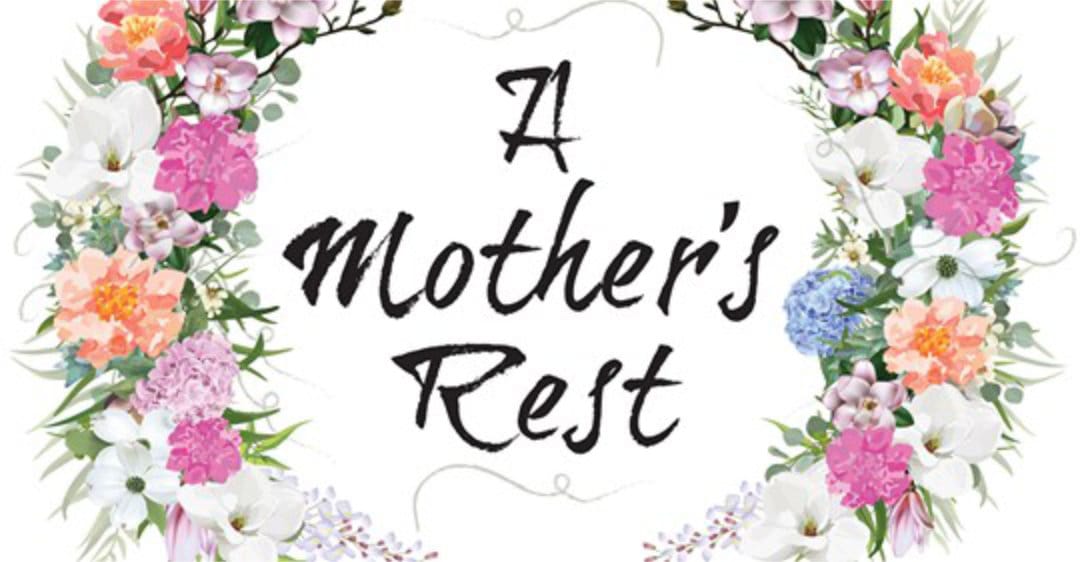 The letters A Mother's Rest with a wreath of spring flowers around it